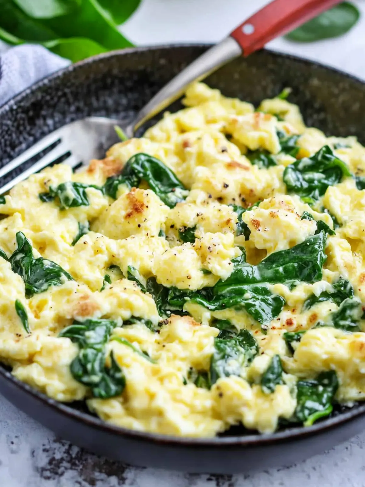 Cheesy Scrambled Eggs with Spinach: Whip Up This Quick Delight 5 Cheesy Scrambled Eggs with Spinach
