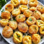 Crispy Baked Parmesan Breaded Tortellini Bites Everyone Loves 6 Crispy baked parmesan breaded tortellini bites