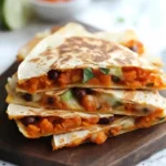 Crispy Roasted Sweet Potato and Bean Quesadillas to Savor 2 Roasted Sweet Potato and Bean Quesadillas.